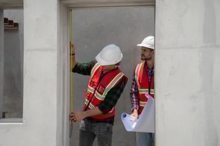 engineer-or-architect-with-a-hardhat-examines-the-2025-03-17-04-27-51-utc